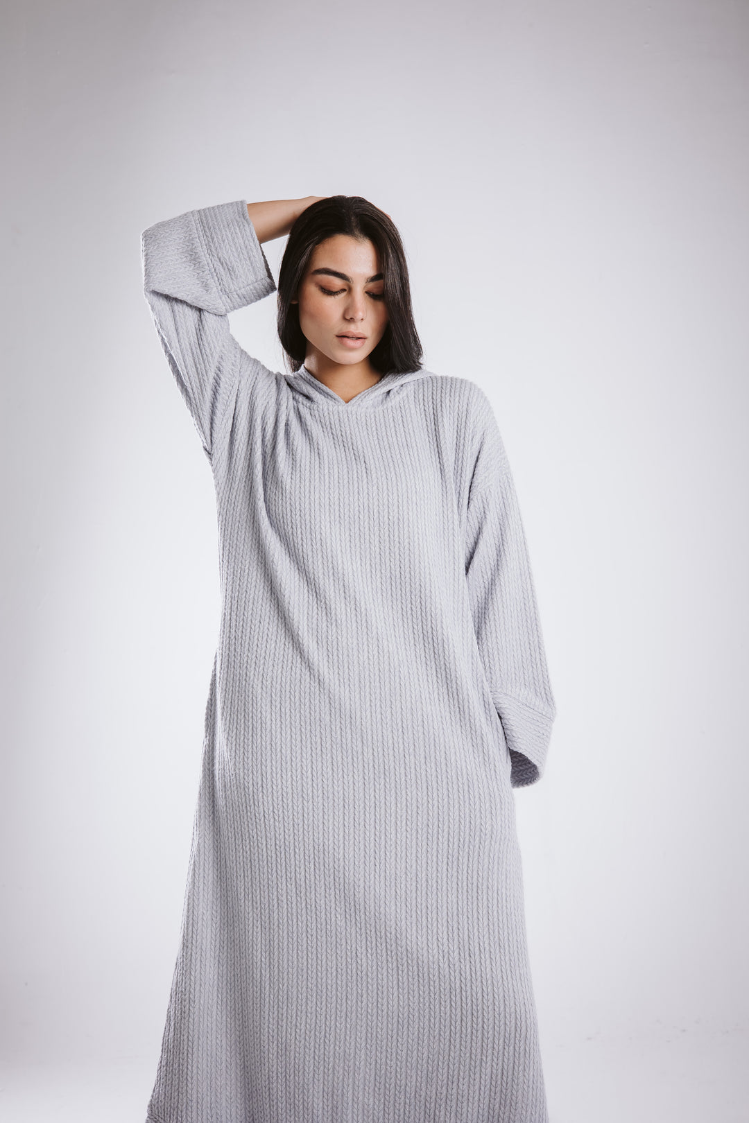 The knitted hoodie dress